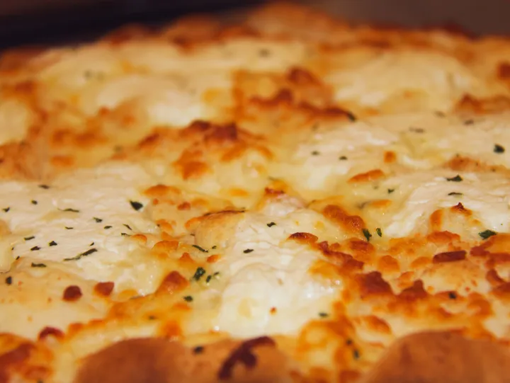 Golden Pizza Bianca served for banquet appetizers