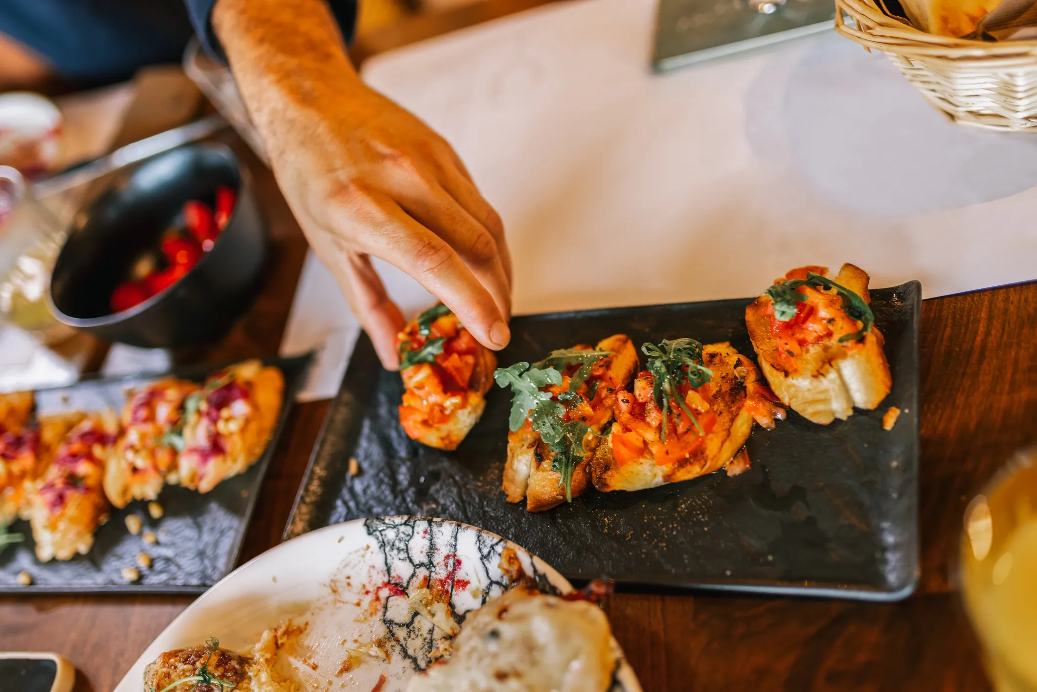 Bruschetta being served on a dining table